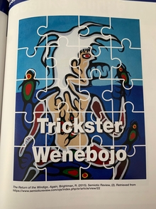 Puzzle pieces with illustration of fish and someone called Trickster Wenebojo from an American Indian legend.  